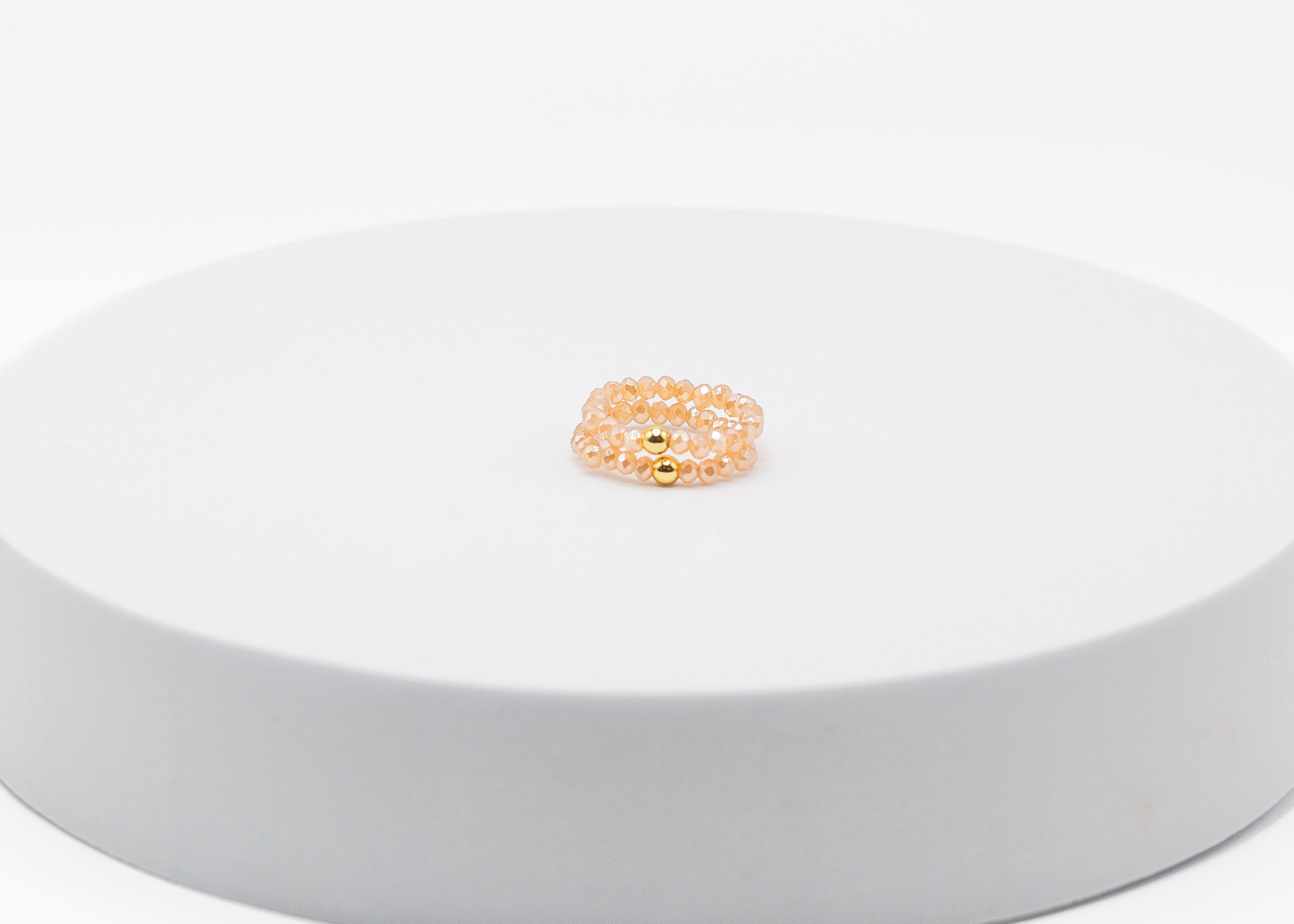 Crystal Stretch Ring with Gold Center Bead (Amber)