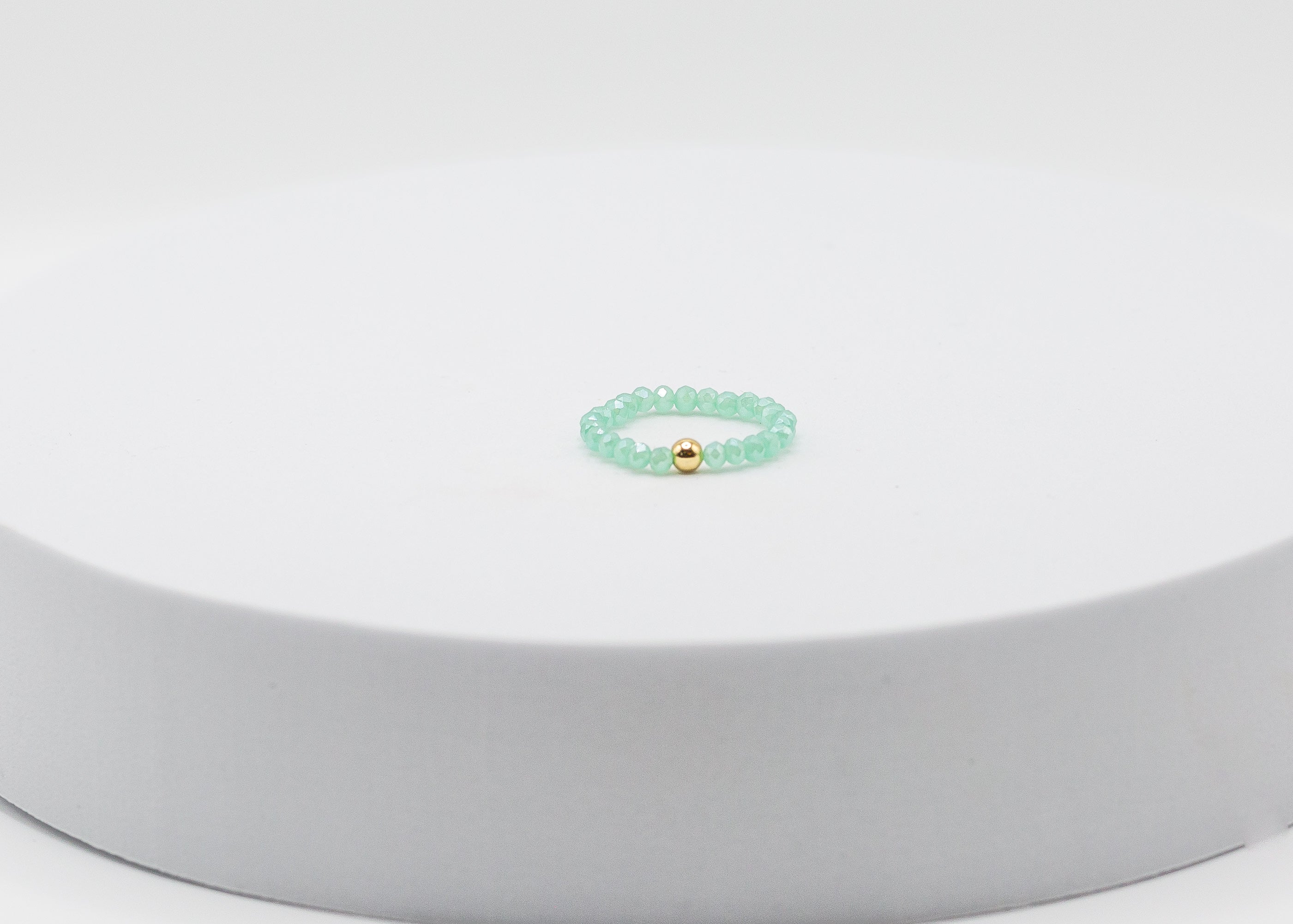 Crystal Stretch Ring with Gold Center Bead (Aqua)