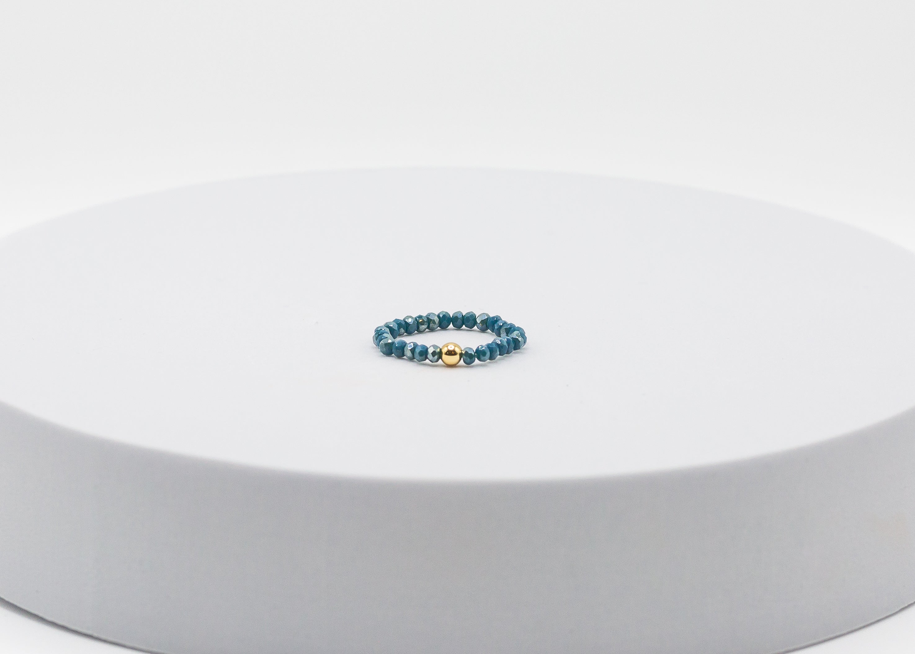Crystal Stretch Ring with Gold Center Bead (Teal)